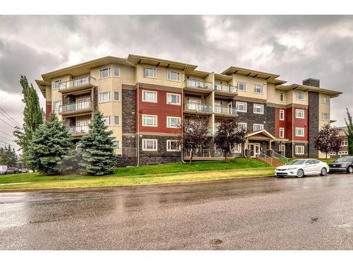 204-11 Millrise Drive Sw, Calgary, AB - Outdoor With Balcony With Facade