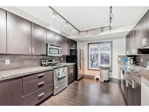 204-11 Millrise Drive Sw, Calgary, AB - Indoor Photo Showing Kitchen