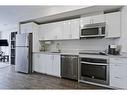 611-450 8 Avenue Se, Calgary, AB  - Indoor Photo Showing Kitchen With Stainless Steel Kitchen 