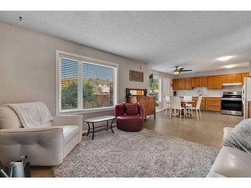 217 Riverwood Close Se, Calgary, AB - Indoor Photo Showing Living Room