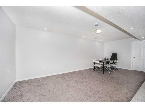 156 Cornerstone Passage Ne, Calgary, AB - Indoor Photo Showing Other Room