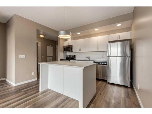 307-4818 Varsity Drive Nw, Calgary, AB - Indoor Photo Showing Kitchen With Upgraded Kitchen