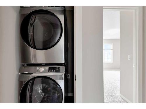 201 Nolanlake Villas Nw, Calgary, AB - Indoor Photo Showing Laundry Room