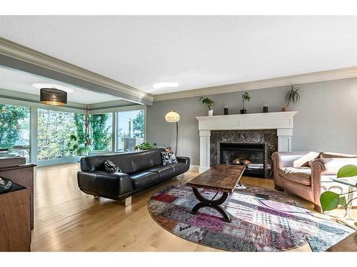 1419 Summit Street Sw, Calgary, AB - Indoor Photo Showing Living Room With Fireplace