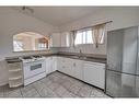 109 Thomson Avenue Ne, Calgary, AB  - Indoor Photo Showing Kitchen 