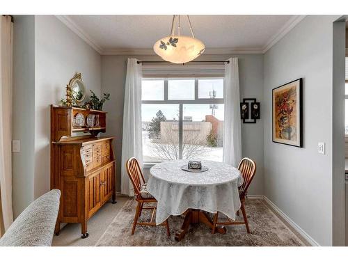 1312-1010 Arbour Lake Road Nw, Calgary, AB - Indoor Photo Showing Dining Room