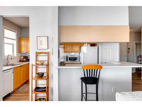 1312-1010 Arbour Lake Road Nw, Calgary, AB - Indoor Photo Showing Kitchen With Double Sink