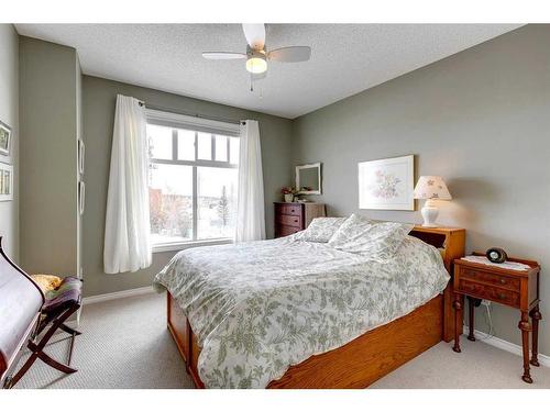 1312-1010 Arbour Lake Road Nw, Calgary, AB - Indoor Photo Showing Bedroom