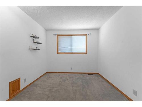 140 Prominence Heights Sw, Calgary, AB - Indoor Photo Showing Other Room