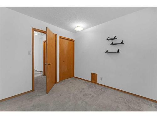 140 Prominence Heights Sw, Calgary, AB - Indoor Photo Showing Other Room