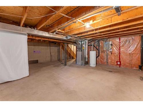 140 Prominence Heights Sw, Calgary, AB - Indoor Photo Showing Basement