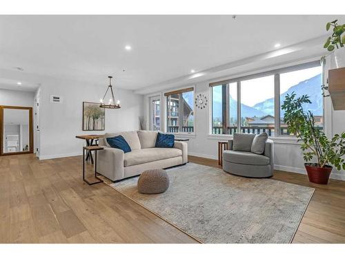 209-1315 Spring Creek Gate, Canmore, AB - Indoor Photo Showing Living Room