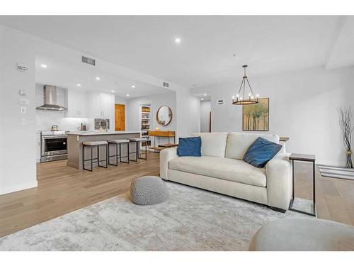 209-1315 Spring Creek Gate, Canmore, AB - Indoor Photo Showing Living Room