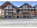 209-1315 Spring Creek Gate, Canmore, AB  - Outdoor With Facade 