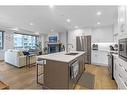 209-1315 Spring Creek Gate, Canmore, AB  - Indoor Photo Showing Kitchen With Double Sink With Upgraded Kitchen 