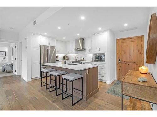 209-1315 Spring Creek Gate, Canmore, AB - Indoor Photo Showing Kitchen With Upgraded Kitchen