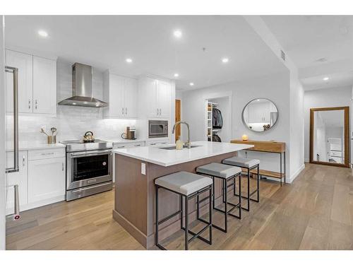 209-1315 Spring Creek Gate, Canmore, AB - Indoor Photo Showing Kitchen With Upgraded Kitchen