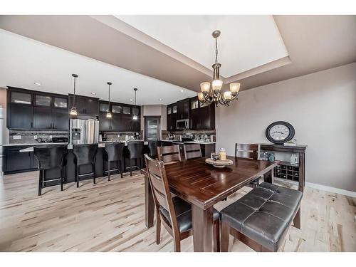 209 Kinniburgh Boulevard, Chestermere, AB - Indoor Photo Showing Dining Room