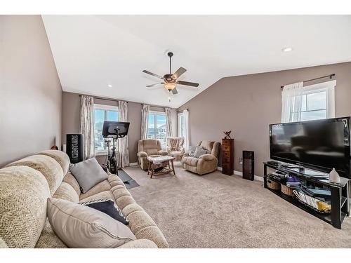 209 Kinniburgh Boulevard, Chestermere, AB - Indoor Photo Showing Living Room