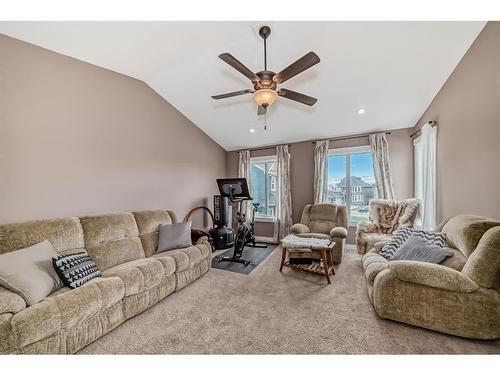 209 Kinniburgh Boulevard, Chestermere, AB - Indoor Photo Showing Living Room