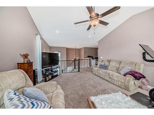 209 Kinniburgh Boulevard, Chestermere, AB - Indoor Photo Showing Living Room