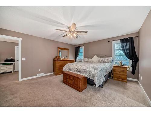 209 Kinniburgh Boulevard, Chestermere, AB - Indoor Photo Showing Bedroom