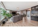 209 Kinniburgh Boulevard, Chestermere, AB  - Indoor Photo Showing Living Room 