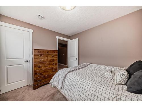 209 Kinniburgh Boulevard, Chestermere, AB - Indoor Photo Showing Bedroom