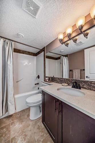 209 Kinniburgh Boulevard, Chestermere, AB - Indoor Photo Showing Bathroom