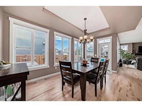 209 Kinniburgh Boulevard, Chestermere, AB - Indoor Photo Showing Dining Room