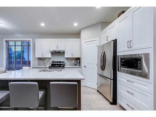 39 Cranridge Crescent Se, Calgary, AB - Indoor Photo Showing Kitchen With Double Sink