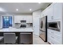 39 Cranridge Crescent Se, Calgary, AB  - Indoor Photo Showing Kitchen With Double Sink 