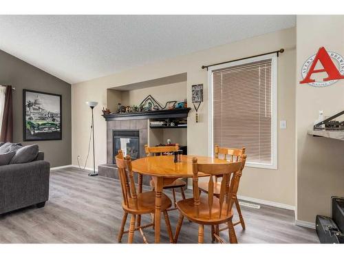 15 Cramond Circle Se, Calgary, AB - Indoor With Fireplace