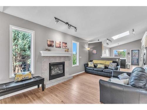 213 West Lakeview Place, Chestermere, AB - Indoor Photo Showing Living Room With Fireplace