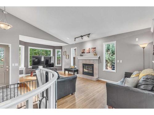 213 West Lakeview Place, Chestermere, AB - Indoor Photo Showing Living Room With Fireplace