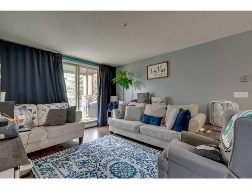 3116-60 Panatella Street Nw, Calgary, AB - Indoor Photo Showing Living Room