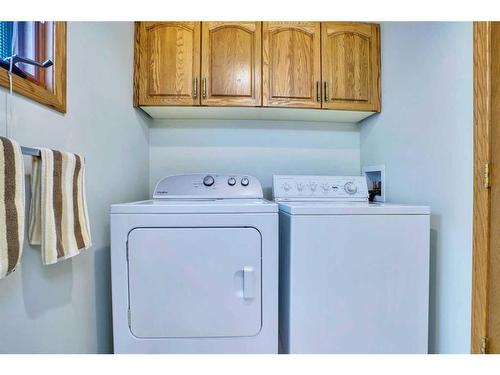 108 Edgebrook Place Nw, Calgary, AB - Indoor Photo Showing Laundry Room