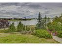 205-8 Country Village Bay Ne, Calgary, AB  - Outdoor With Body Of Water With View 