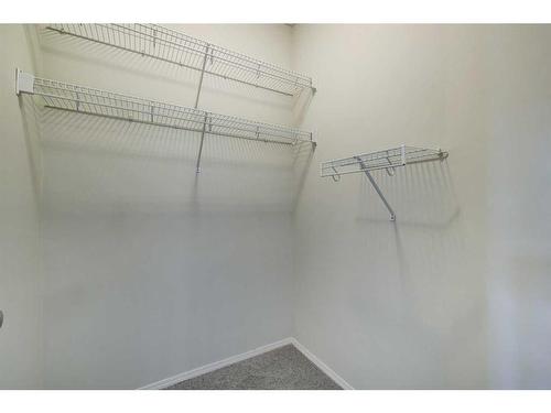 205-8 Country Village Bay Ne, Calgary, AB - Indoor With Storage