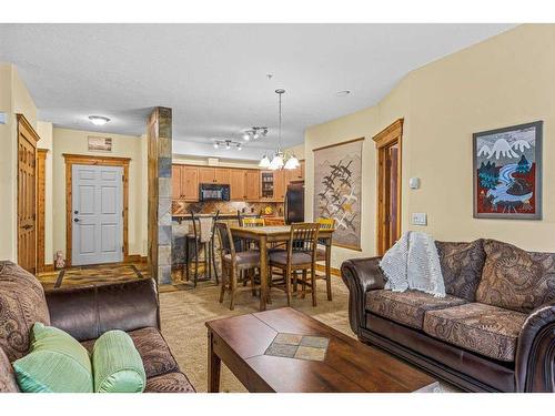 112-175 Crossbow Place, Canmore, AB - Indoor Photo Showing Living Room