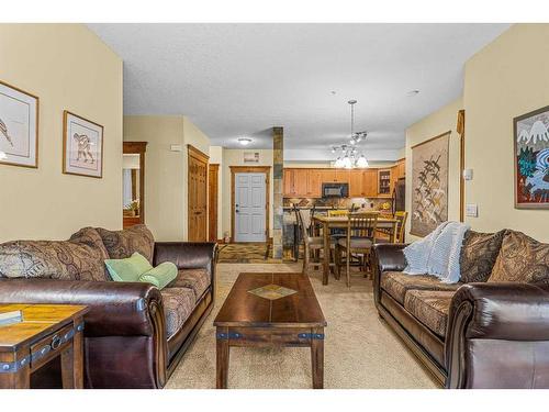 112-175 Crossbow Place, Canmore, AB - Indoor Photo Showing Living Room