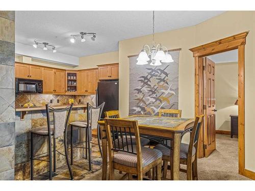 112-175 Crossbow Place, Canmore, AB - Indoor Photo Showing Dining Room