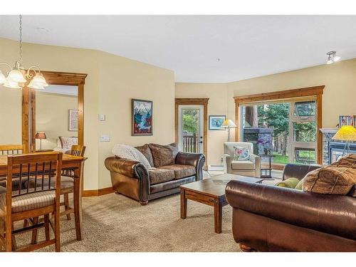 112-175 Crossbow Place, Canmore, AB - Indoor Photo Showing Living Room