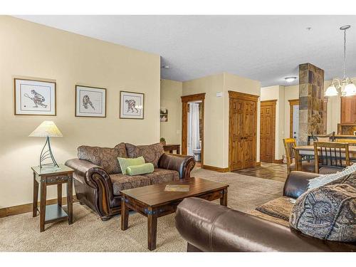 112-175 Crossbow Place, Canmore, AB - Indoor Photo Showing Living Room