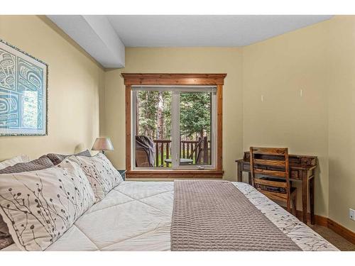 112-175 Crossbow Place, Canmore, AB - Indoor Photo Showing Bedroom