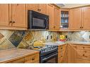 112-175 Crossbow Place, Canmore, AB  - Indoor Photo Showing Kitchen 