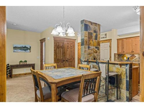 112-175 Crossbow Place, Canmore, AB - Indoor Photo Showing Dining Room