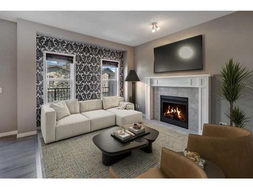 277 Kincora Glen Rise Nw, Calgary, AB - Indoor Photo Showing Living Room With Fireplace