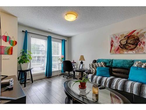 56 Auburn Bay Link Se, Calgary, AB - Indoor Photo Showing Living Room