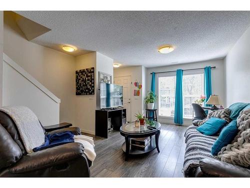 56 Auburn Bay Link Se, Calgary, AB - Indoor Photo Showing Living Room